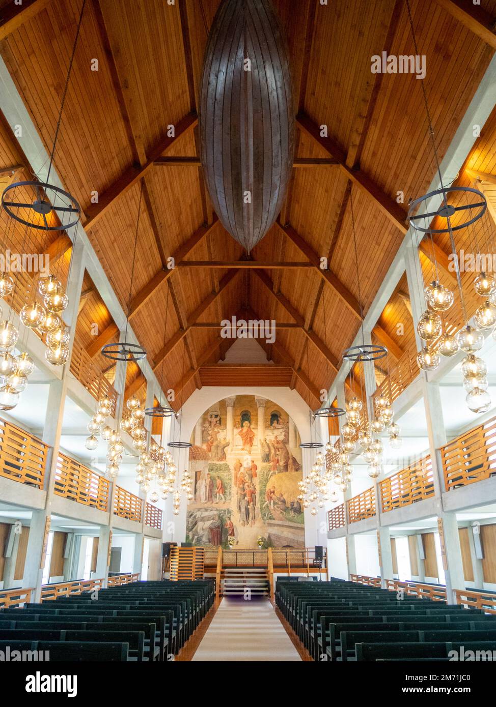 Klaksvík church interior, with traditional whaling boat hanging in the