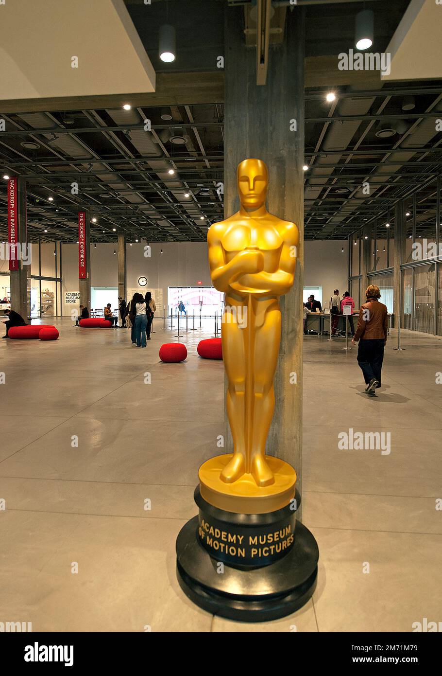 Oscar statue replica inside the lobby of the Academy Museum of Motion Pictures in Los Angeles, CA Stock Photo