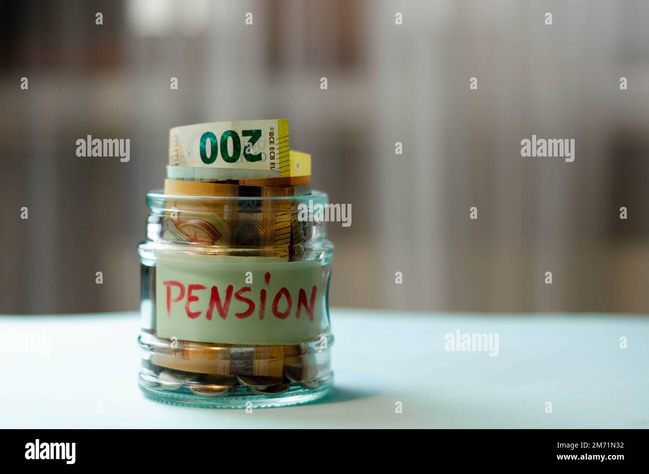 Concept of pension. Fall  reduction pension payments. Retirement. Financing retirees. Reduction of the pension fund. The low size of pensions. Poverty Stock Photo