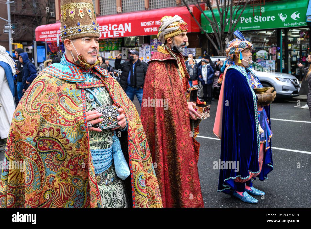New York, USA. 6th Jan, 2023. Prticipants dressed up as Balthasar, Gaspar and Melchior the Wise Men march through the streets in East Harlem during the 46th annual Three Kings Day Parade organized by El Museo del Bario. The traditional Spanish celebration was held in person for the first time since the start of the coronavirus (COVID-19) pandemic. The theme for this year was: 'Entre Familia: Mental Health & Wellness of our Communities' focusing on the importance of mental health and wellness. Credit: Enrique Shore/Alamy Live News Stock Photo