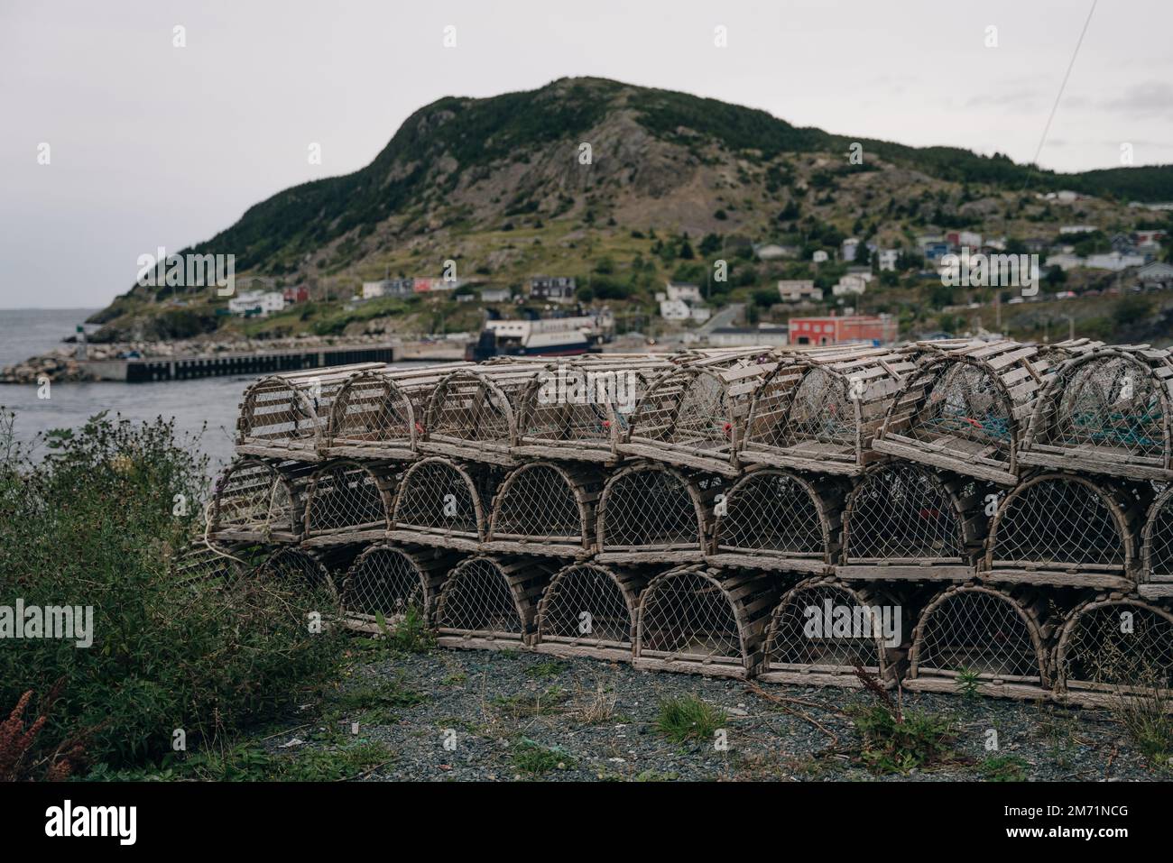 a selection of lobster pots on the boardwalk in newfoundland, canada. High quality photo Stock Photo