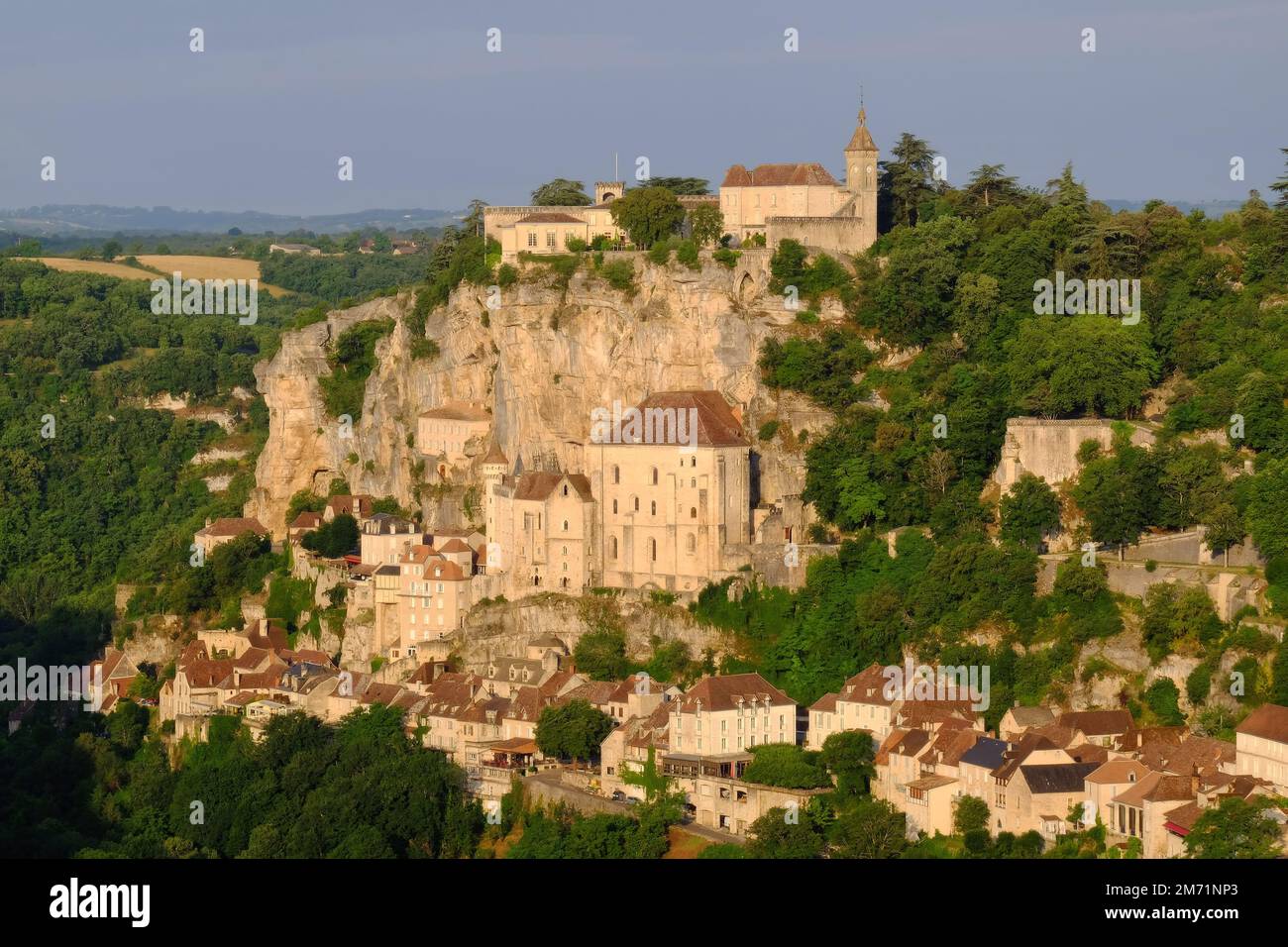 Rocamadour: Clifftop village, churches and sanctuary soon after sunrise at Rocamadour, Lot, Dordogne, Occitanie, France Stock Photo