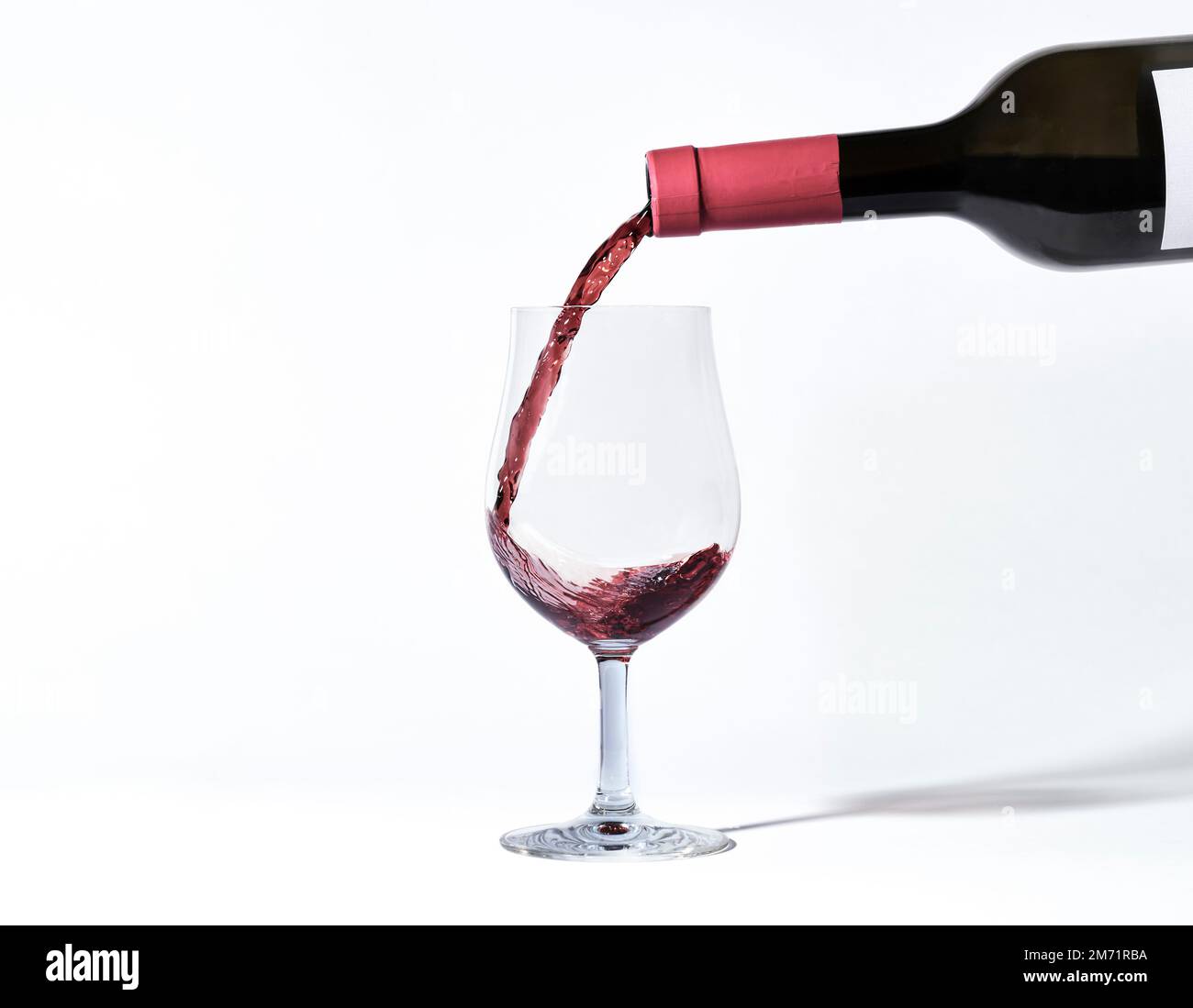 Glass of wine. put in red wine. Wine bottles and glasses. Eating and