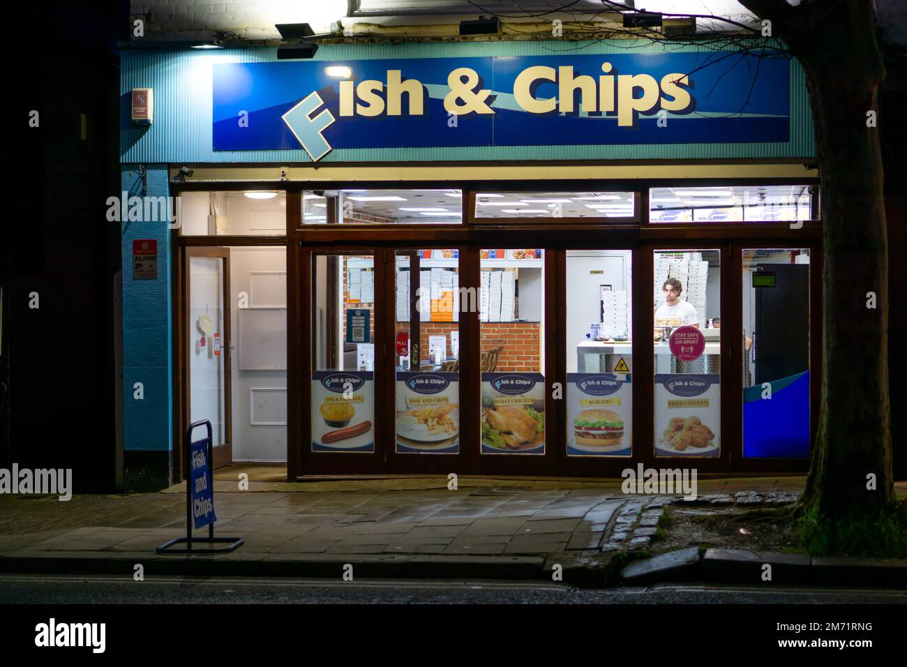 Traditional British fish and chips shop at night in Saffron Walden Stock Photo Alamy