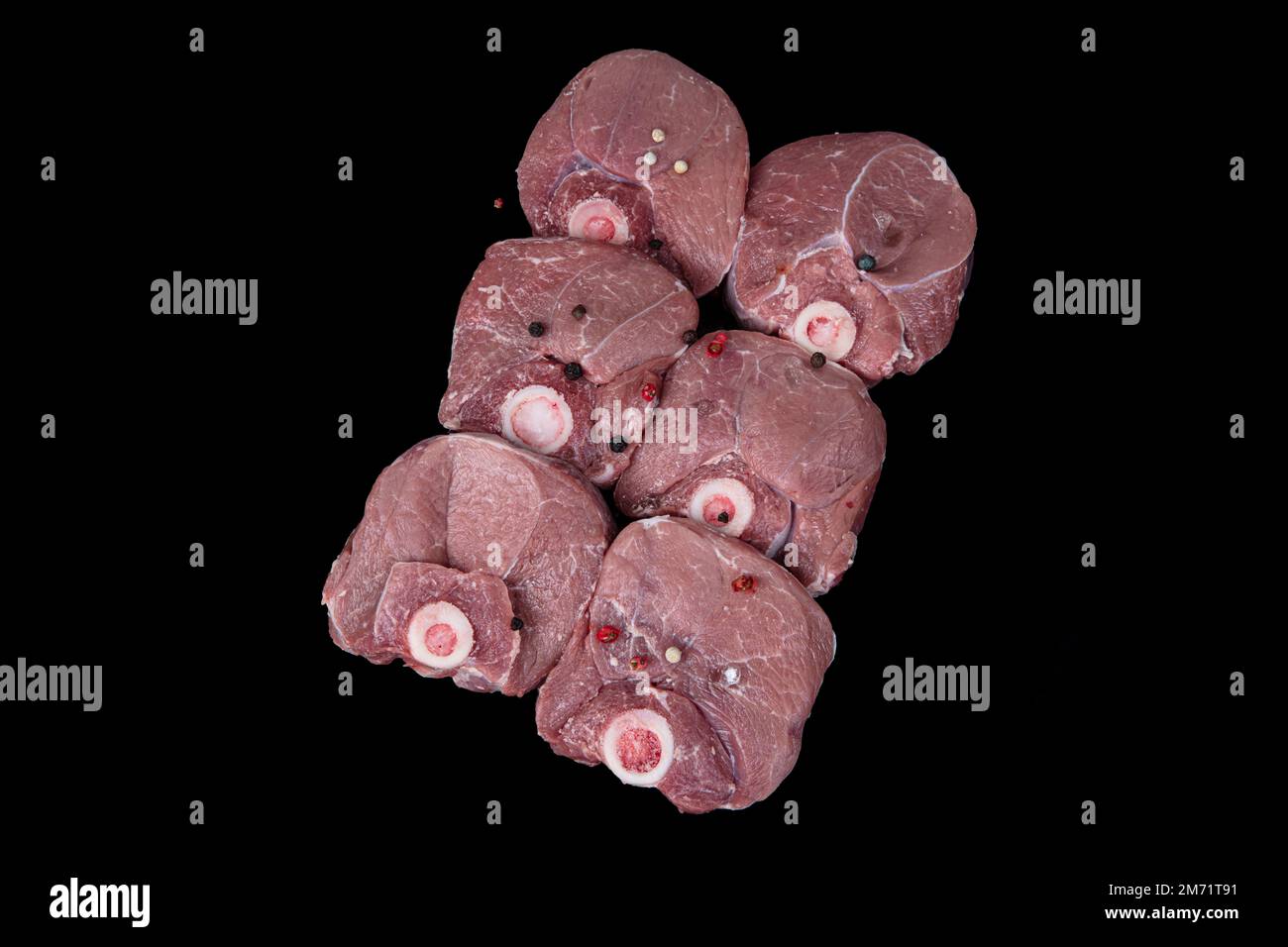 Raw lamb shanks meat, Raw lamb leg (Turkish name; kuzu incik). Fresh raw meat of leg young lamb. Raw lamb leg on marble stone background with herbs. I Stock Photo
