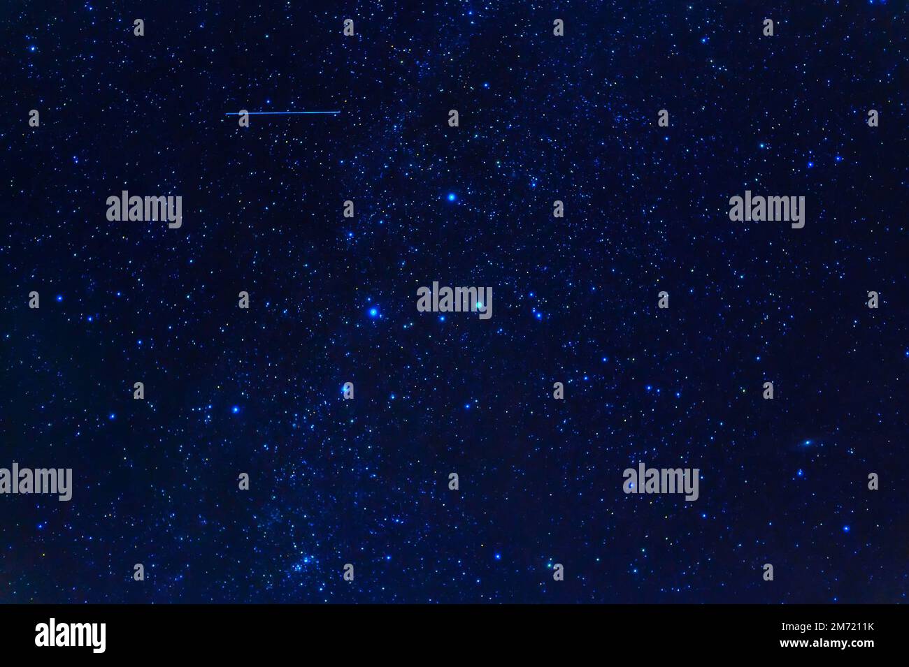 constellation of Orion on the background of a blue starry sky ...