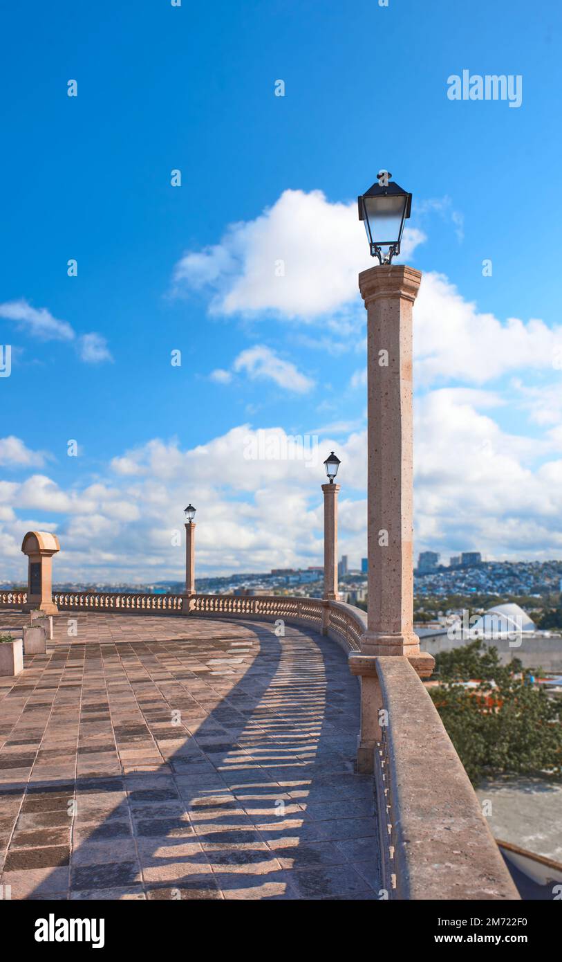 viewpoint of querétaro during the day with blue sky, with stone columns and lampposts, no people Stock Photo