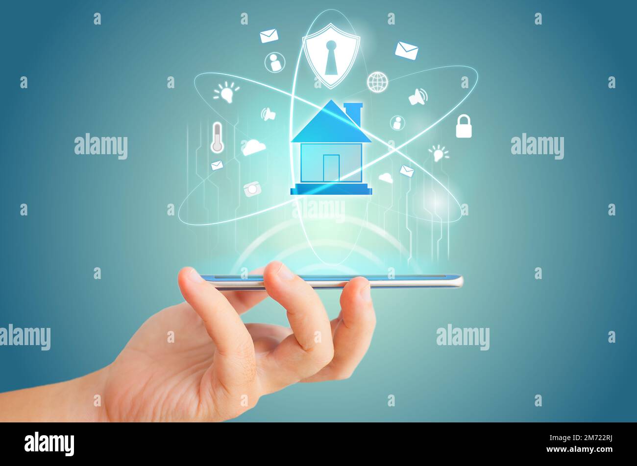Smart phone remote for smart home hologram technology concept idea. Stock Photo