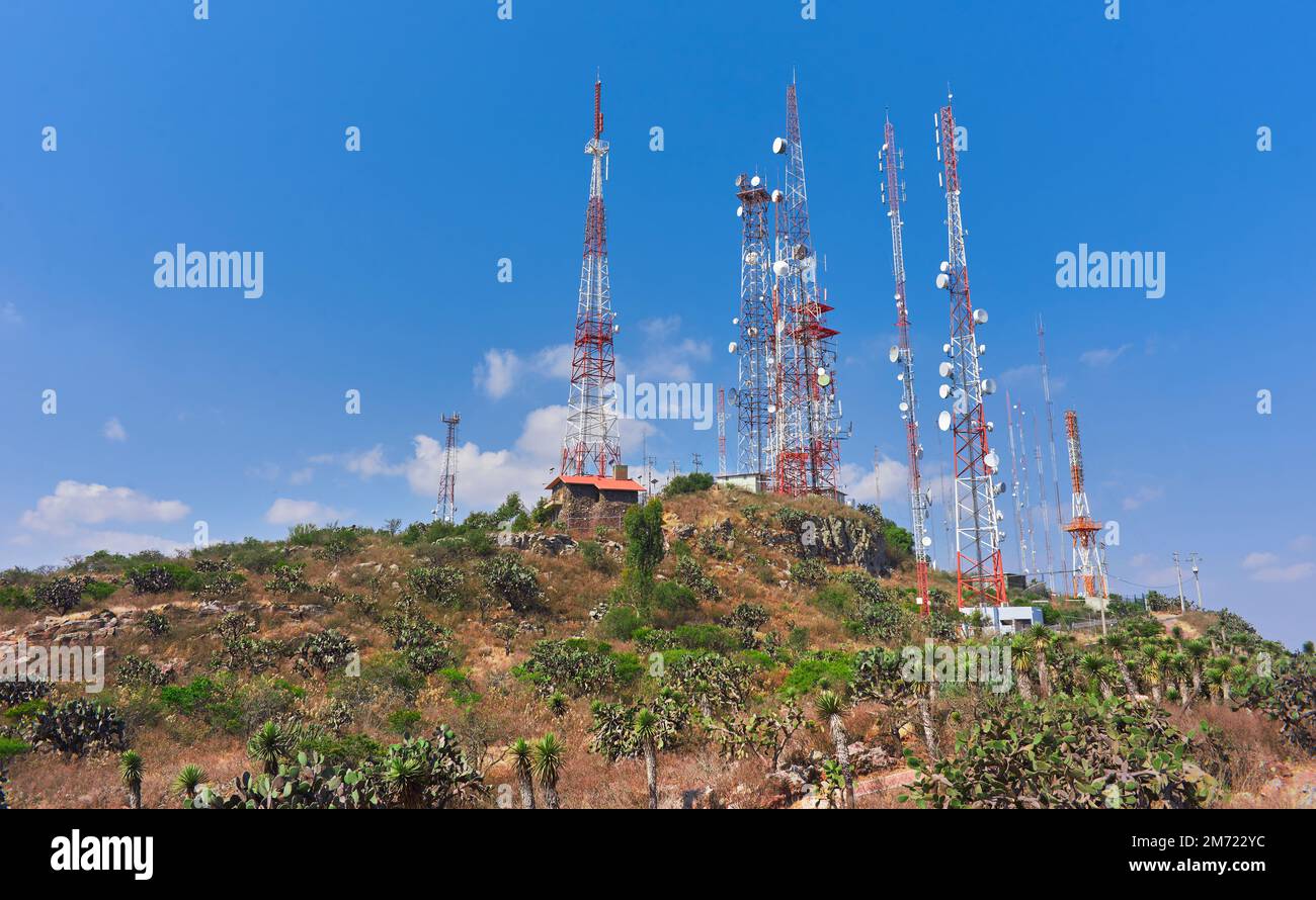 communication towers on top of a mountain in the middle of the desert ...