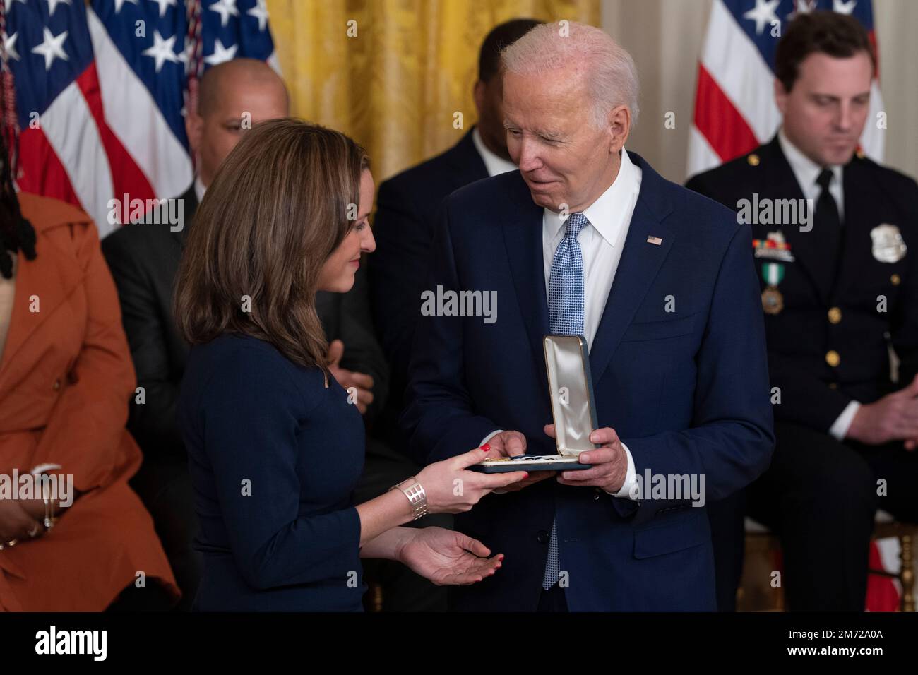 United States President Joe Biden presents the the Presidential Citizens Medal to Michigan Secretary of State Jocelyn Benson during a ceremony marking the the two-year anniversary of the January 6th insurrection at the White House in Washington, DC, Friday, January 6, 2023. Biden awarded the Presidential Citizens Medal to Capitol Police Officer Eugene Goodman, Former Washington, DC police Officer Michael Fanone, Capitol Police Officer Caroline Edwards, Capitol Police Officer Brian Sicknick (posthumously), Election Workers Shaye Moss and her mother Ruby Freeman, Arizona House speaker Rusty Bowe Stock Photo