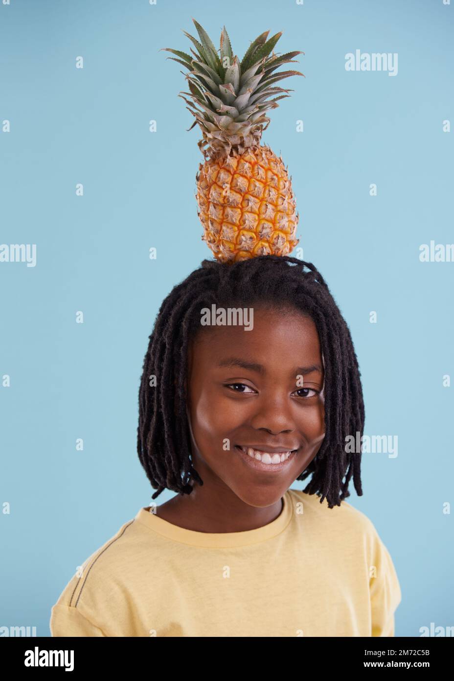 Lets get tropical. A cropped view of a young african teen with a