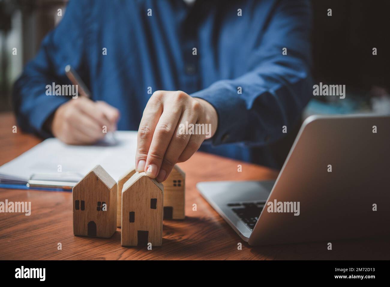 Selling real estate, insurance, buying a house and paying land taxes. Making contracts and legal agreements. Stock Photo