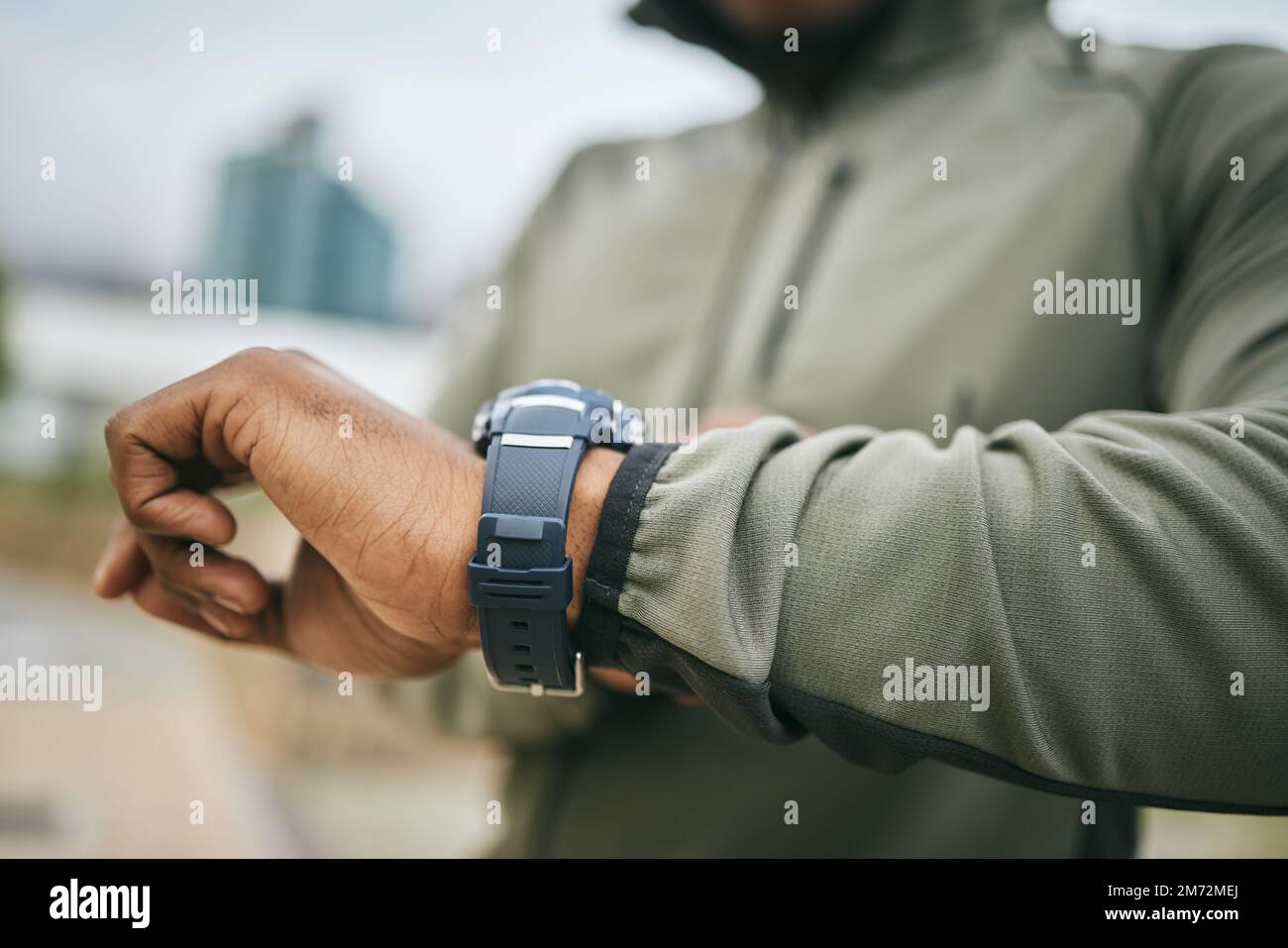 Fitness, training and hand of a man with a watch for progress, exercise  monitor and tracking health in Germany. Goal, performance and runner  reading Stock Photo - Alamy