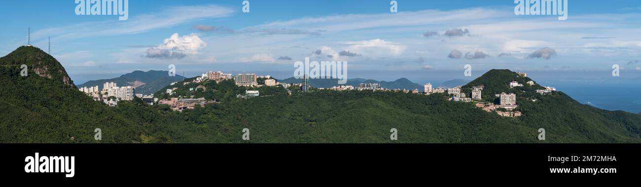 Telephoto panorama of luxury housing on The Peak and Mount Kellett, Hong Kong Island, 2012 Stock Photo