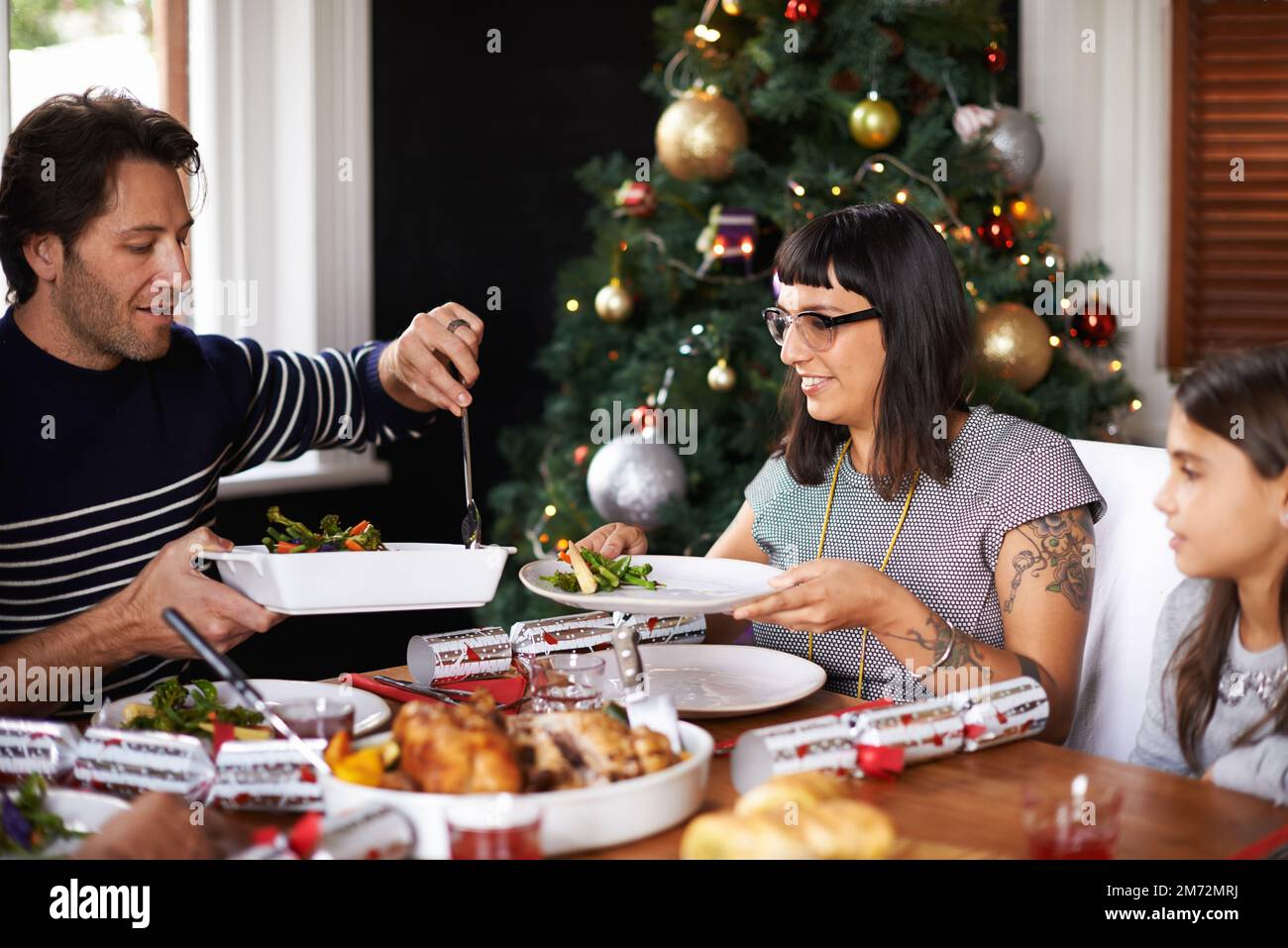 Wow hubby this looks great. a husband dishing up lunch for his wife. Stock Photo