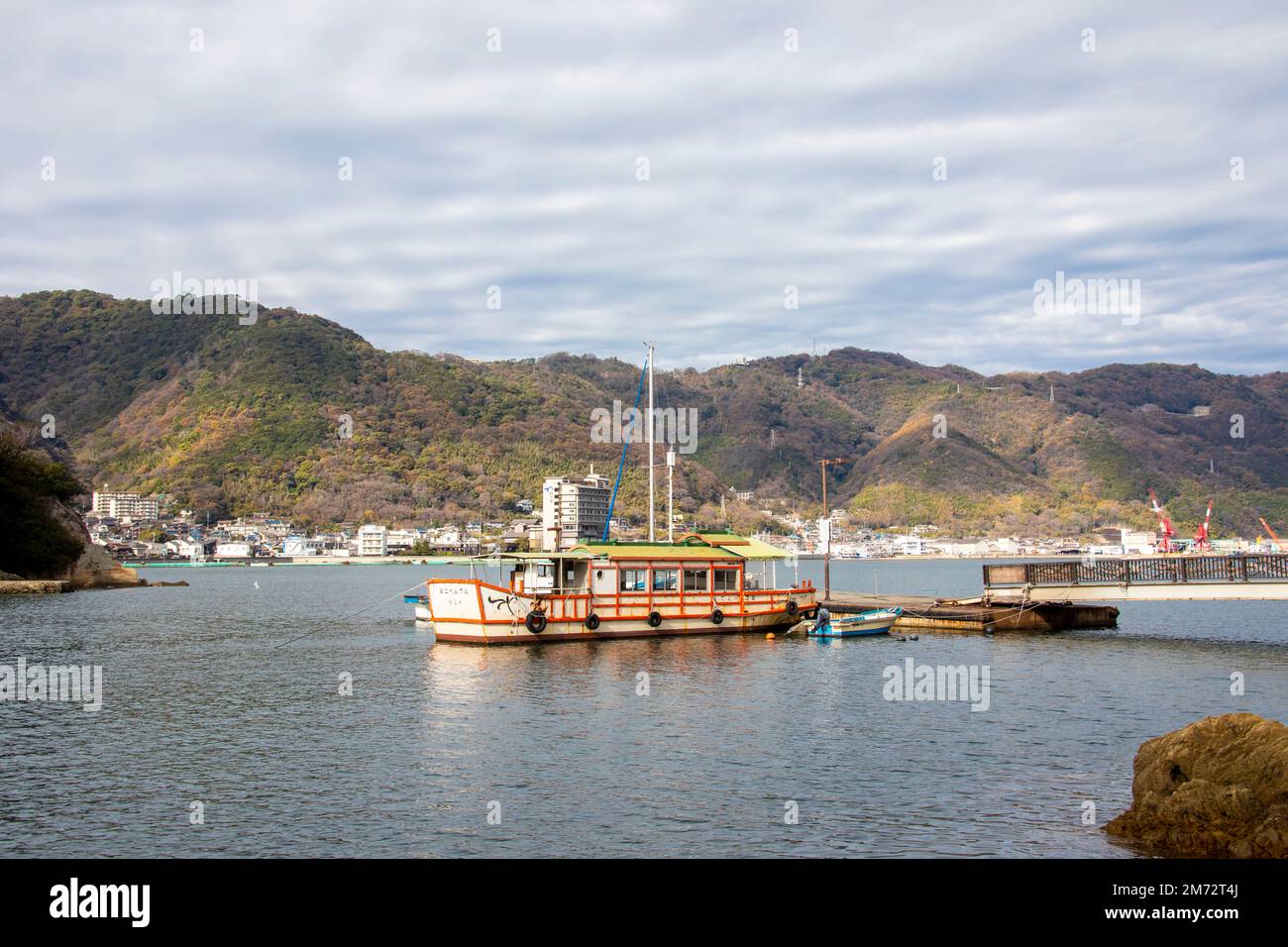 Fukuyama Japan 5th Dec 2022: The  ferry and ferry pier of Sensui Island. A small island in the Seto Inland Sea, The background is the city Tomonoura. Stock Photo