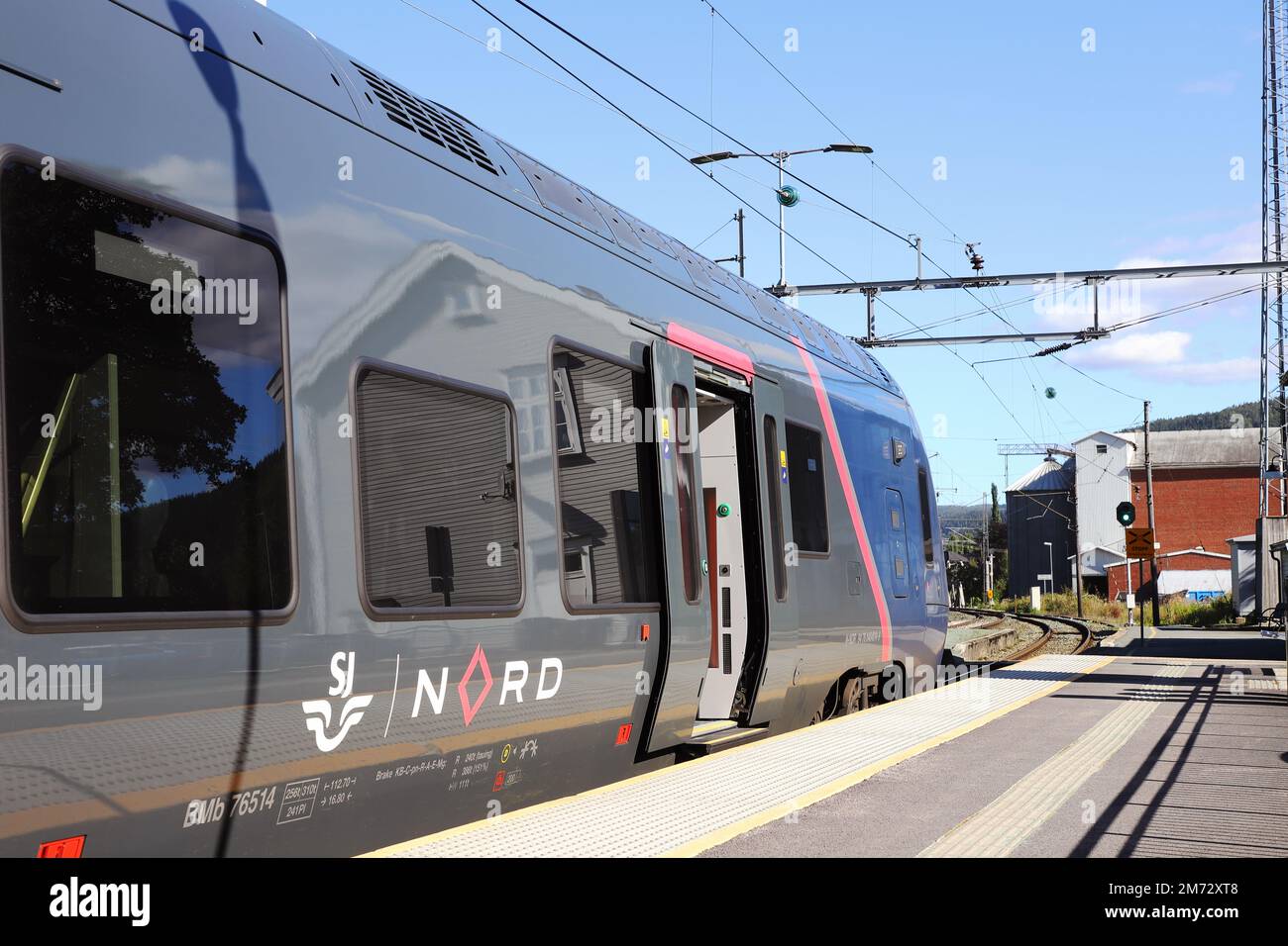 Lundamo, Norway - September 2, 2022: SJ Nord class 76 commuter train at Lundamo station south of Trondheim. Stock Photo