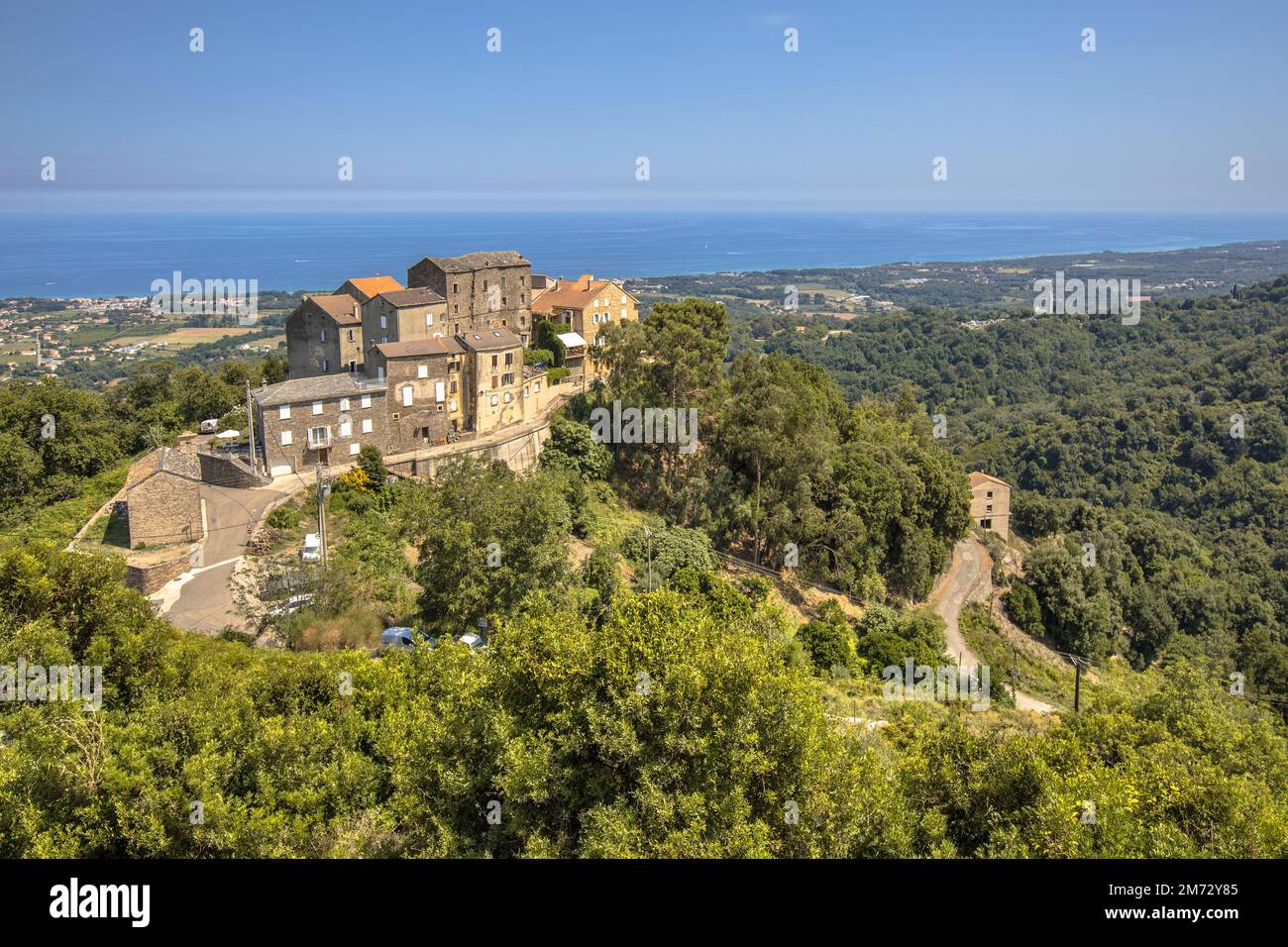 Mountain Village of Coccola near Santa-lucia-di-moriani with view over the mediteranean sea on Corsica, France Stock Photo