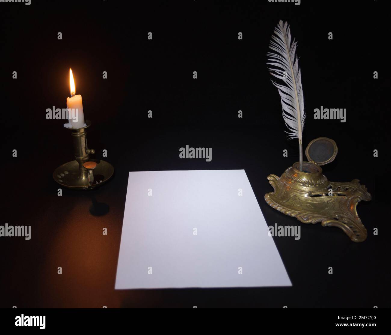 Decorative inkwell and candlestick. Styling writing instruments. Candle