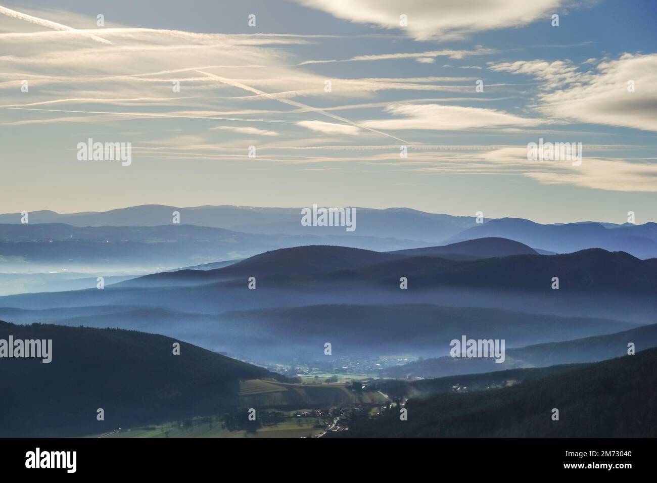 amazing view to lot of mountains with fog in the valley during hiking ...