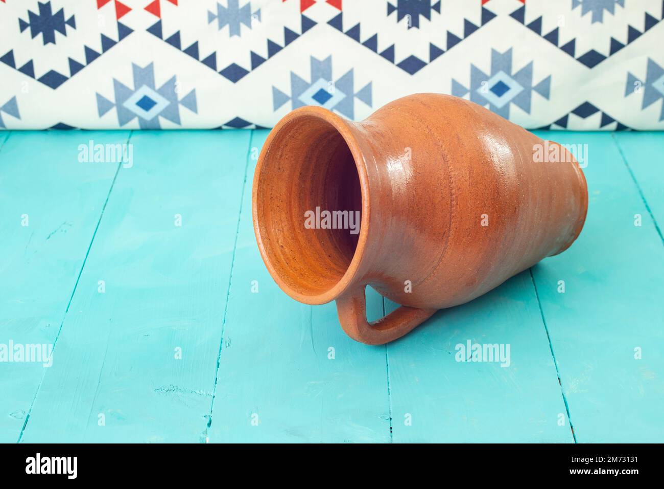 Red clay vase, kitchen pottery, soft focus side view Stock Photo Alamy