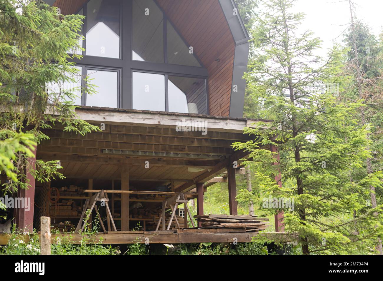 wooden house in the forest Stock Photo - Alamy
