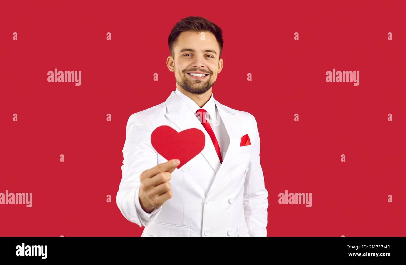 Smiling handsome man congratulate with valentine day Stock Photo