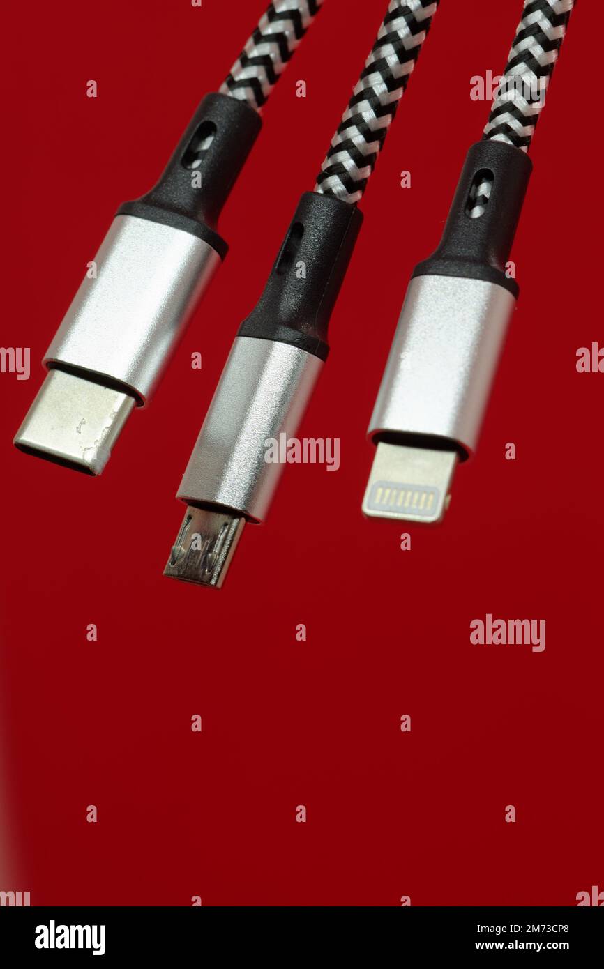 Close-up, cropped, Copyspace: Detailed view of three USB charging plugs Stock Photo