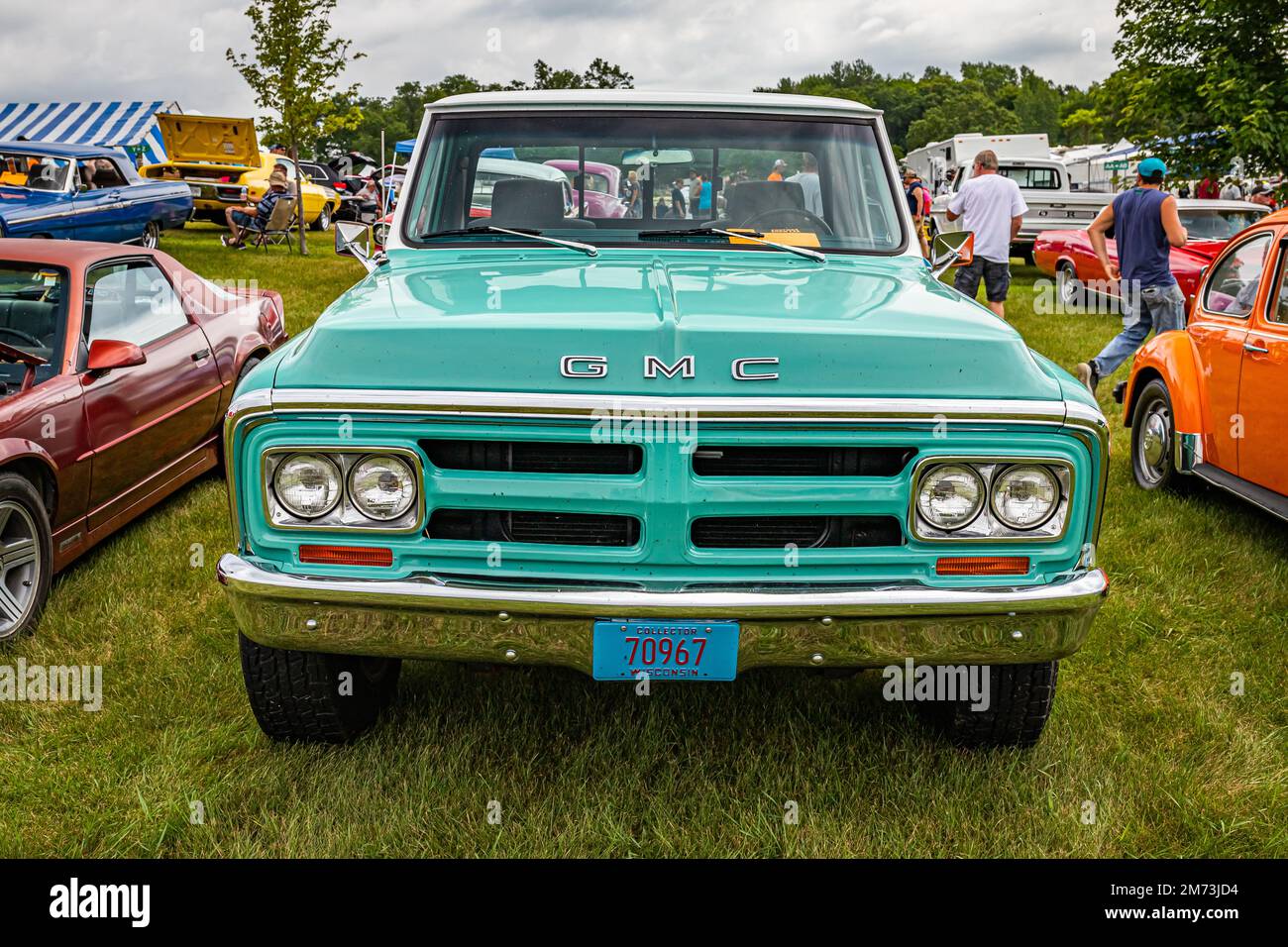 Iola, WI - July 07, 2022: High perspective front view of a 1968 GMC 1500 Stepside Pickup Truck at a local car show. Stock Photo