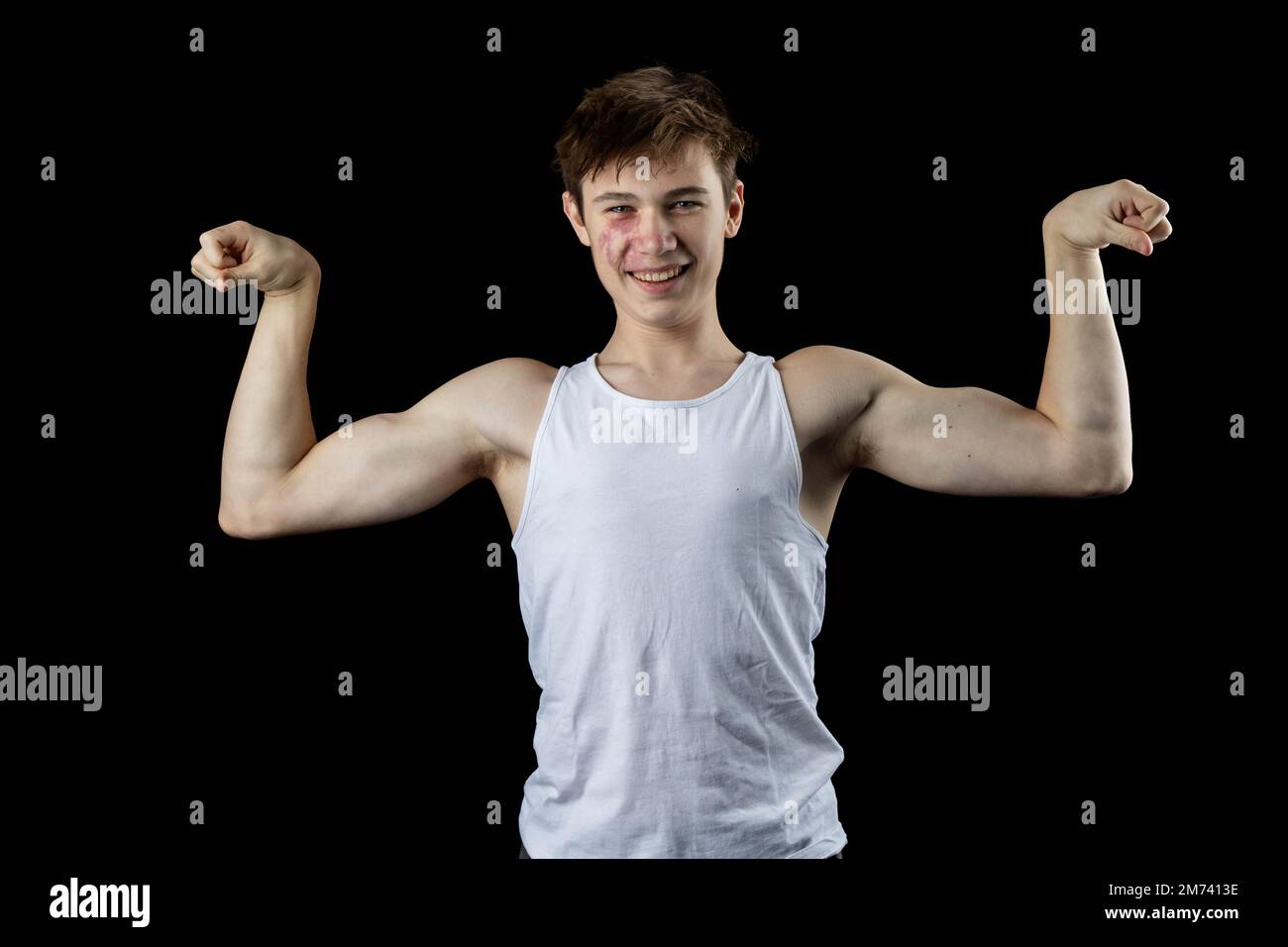 Flexing muscles white background hi-res stock photography and