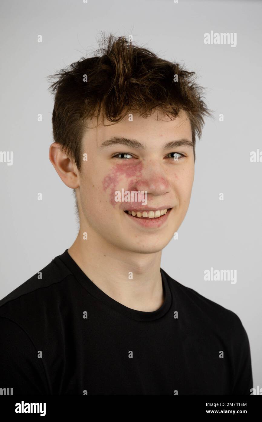 A Portrait of a 17 year old boy wearing a black tshirt Stock Photo Alamy