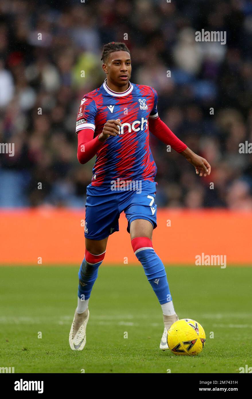 Michael Olise #7 of Crystal Palace grimacing with pain Stock Photo