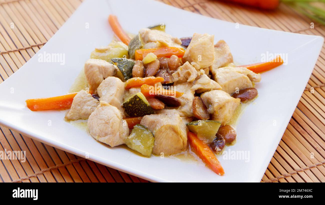 Chicken with almonds and vegetables. Traditional chinese recipe Stock