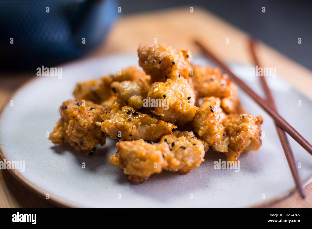 Karaage chicken served with honey and sesam Stock Photo Alamy