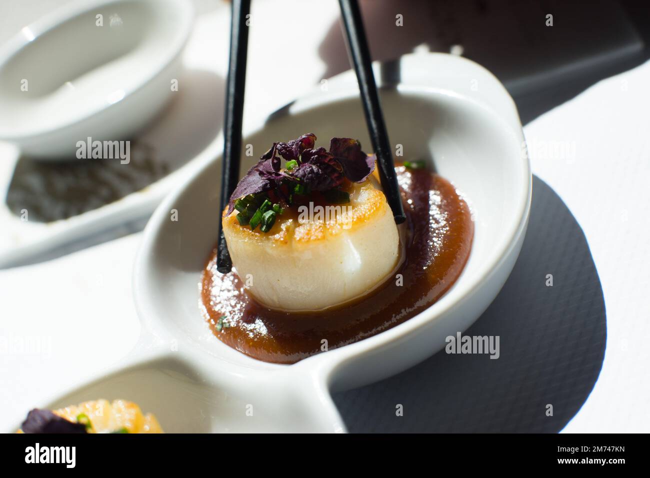 Grilled scallops with miso sauce in a luxury restaurant in Tokyo Stock
