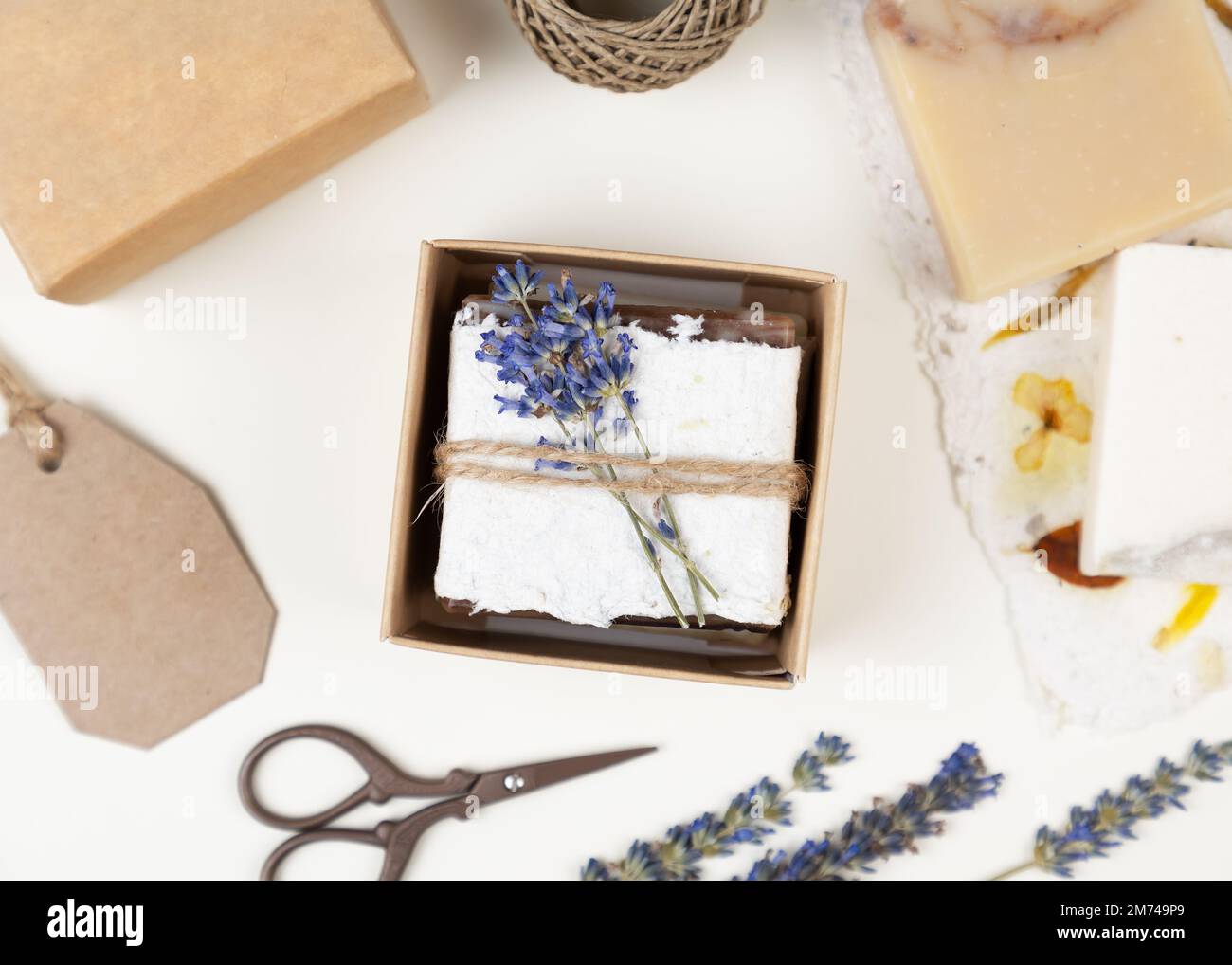 Natural homemade soap wrapped in handmade pressed floral paper