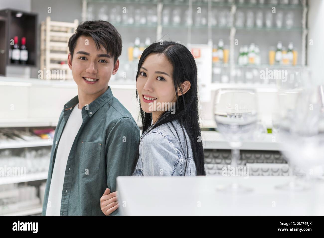 Young couples to buy household items Stock Photo Alamy