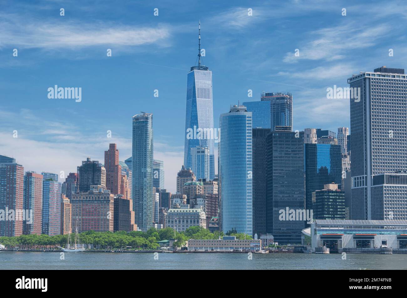 The iconic lower manhattan new york city skyline on a sunny summer day ...