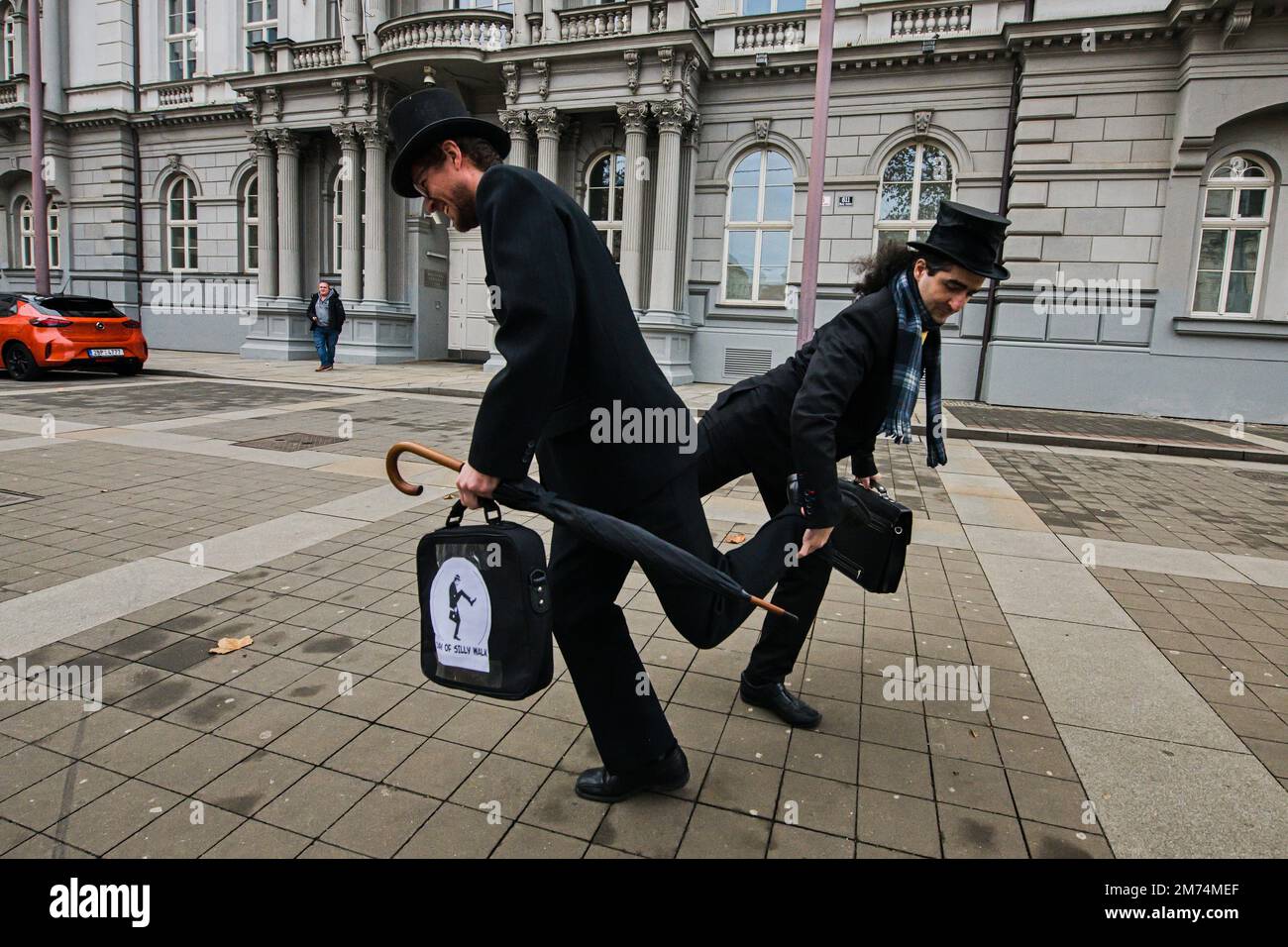 Tenth mock event called 'Silly Walks through Brno' on the occasion of International Silly Walk Day inspired by British comedy troupe Monty Python. Participants meet outside Supreme Administrative Court at Justice statue in Brno, Czech Republic, January 7, 2023. (CTK Photo/Patrik Uhlir) Stock Photo