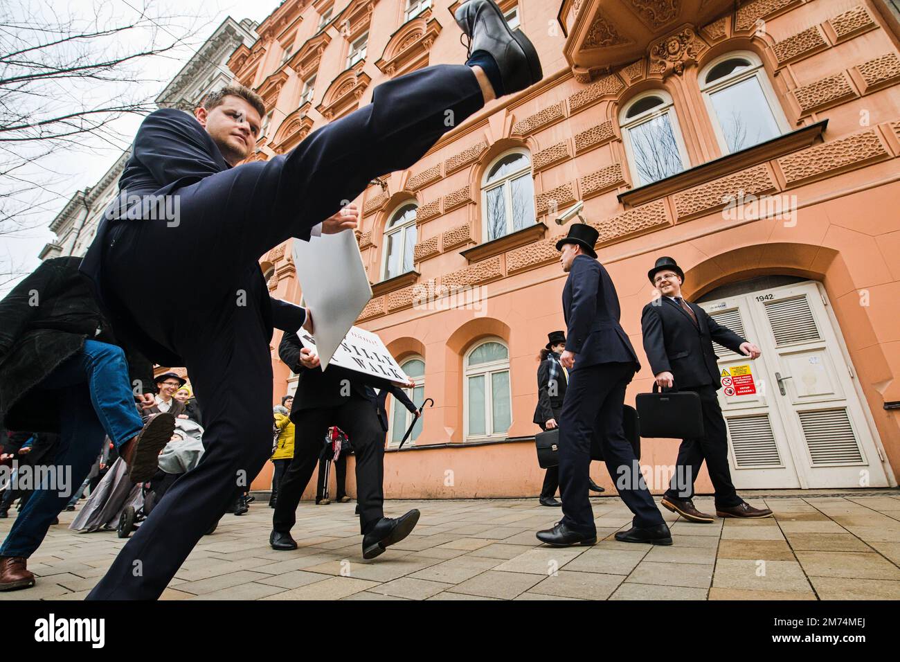 Tenth mock event called 'Silly Walks through Brno' on the occasion of International Silly Walk Day inspired by British comedy troupe Monty Python. Participants meet outside Supreme Administrative Court at Justice statue in Brno, Czech Republic, January 7, 2023. (CTK Photo/Patrik Uhlir) Stock Photo