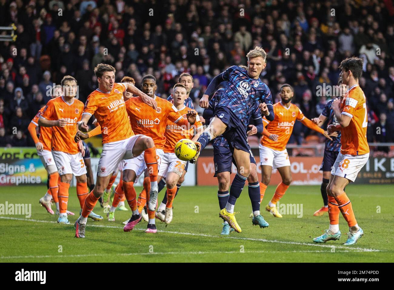Sam Surridge #16 of Nottingham Forest flicks the ball on goal, saved by Chris Maxwell #1 of Blackpool during the Emirates FA Cup Third Round match Blackpool vs Nottingham Forest at Bloomfield Road, Blackpool, United Kingdom, 7th January 2023  (Photo by Mark Cosgrove/News Images) Stock Photo