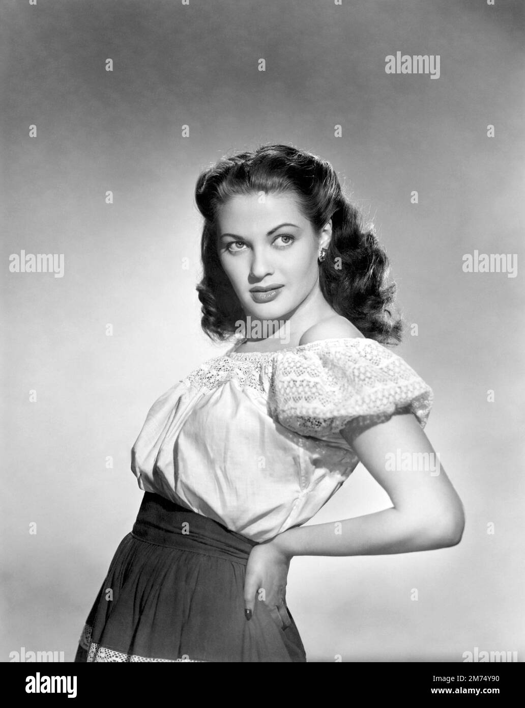 YVONNE DE CARLO in BRUTE FORCE (1947), directed by JULES DASSIN. Credit