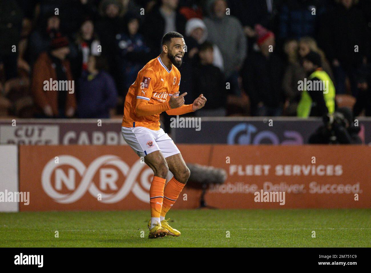 CJ Hamilton #22 of Blackpool celebrates his goal to make it 3-0 during ...