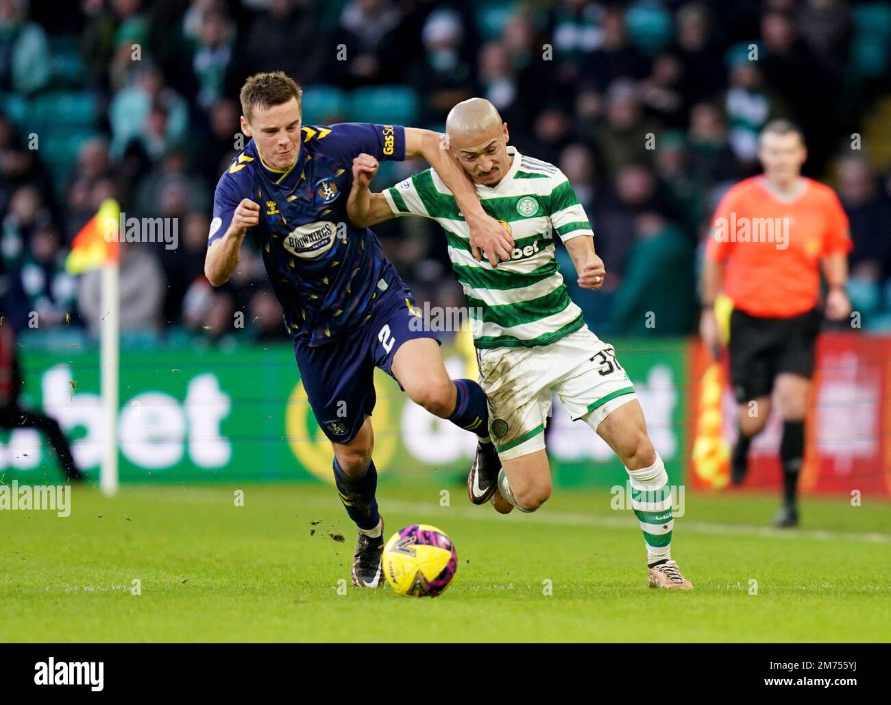 Kilmarnock's Lewis Mayo (left) and Celtic's Daizen Maeda battle for the ball during the cinch Premiership match at Celtic Park, Glasgow. Picture date: Saturday January 7, 2023. Stock Photo