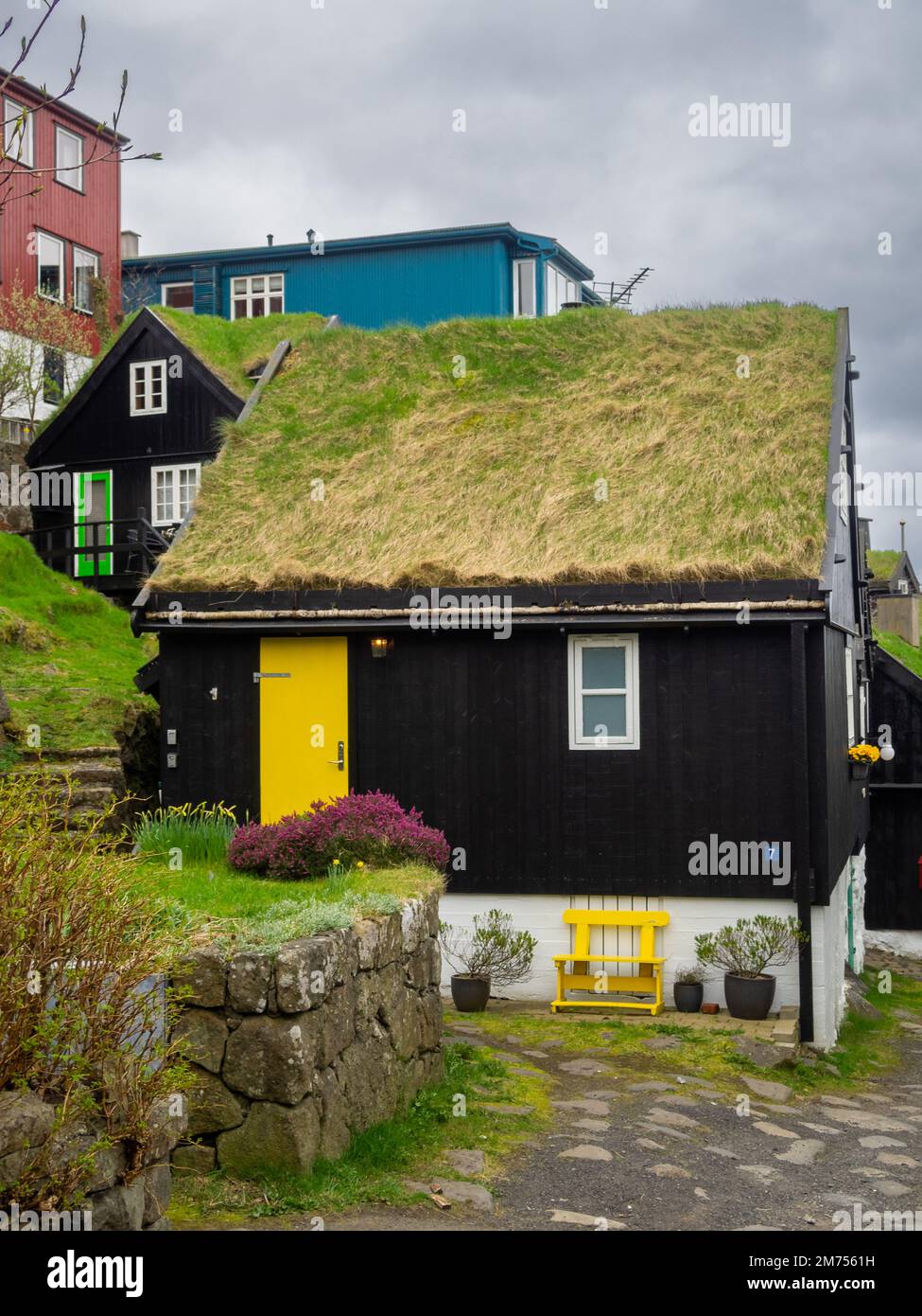 Tinganes street with turf roofed red houses, Tórshavn Stock Photo