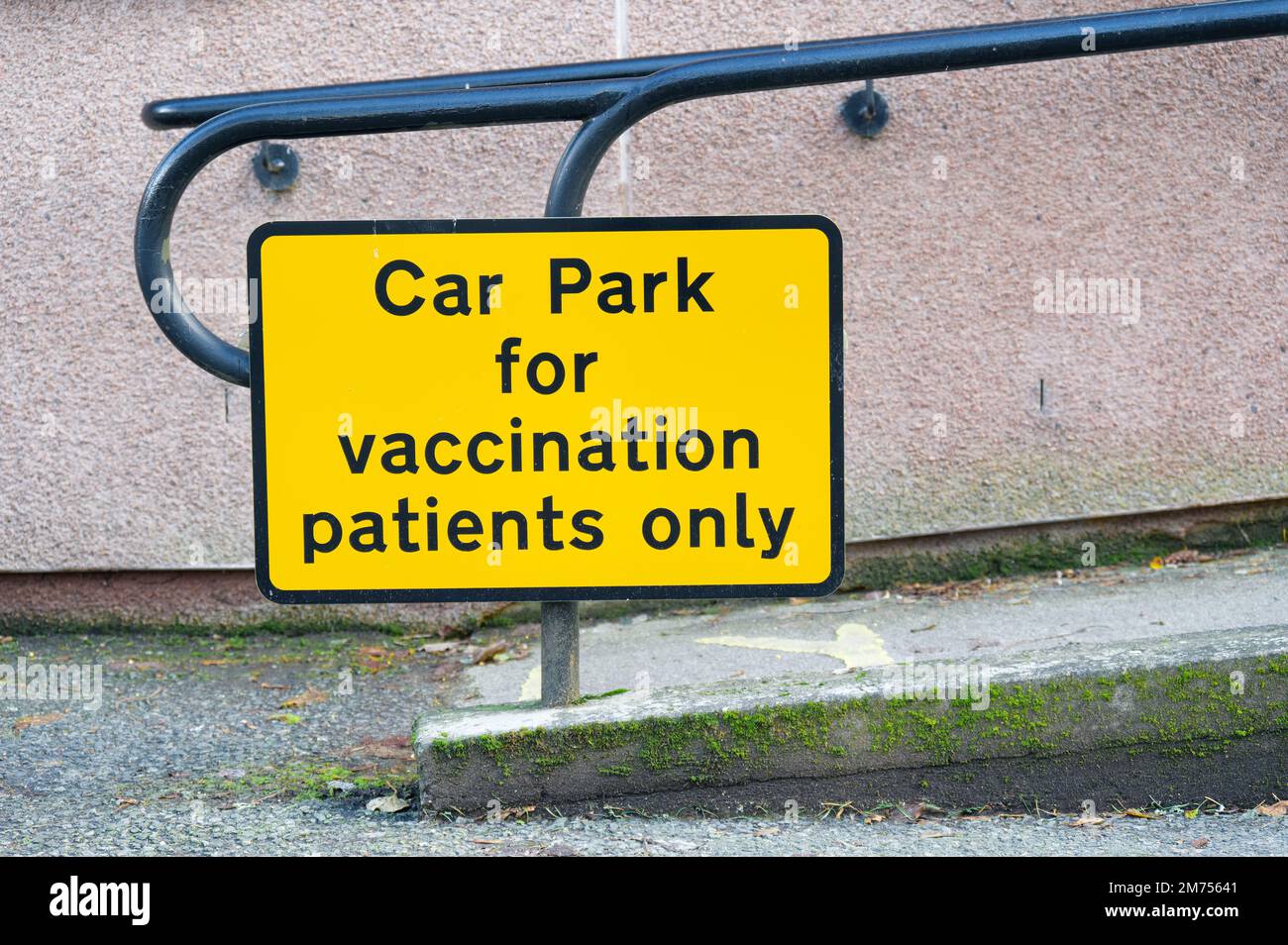 Vaccination patient for covid 19 car park sign at medical centre Stock Photo