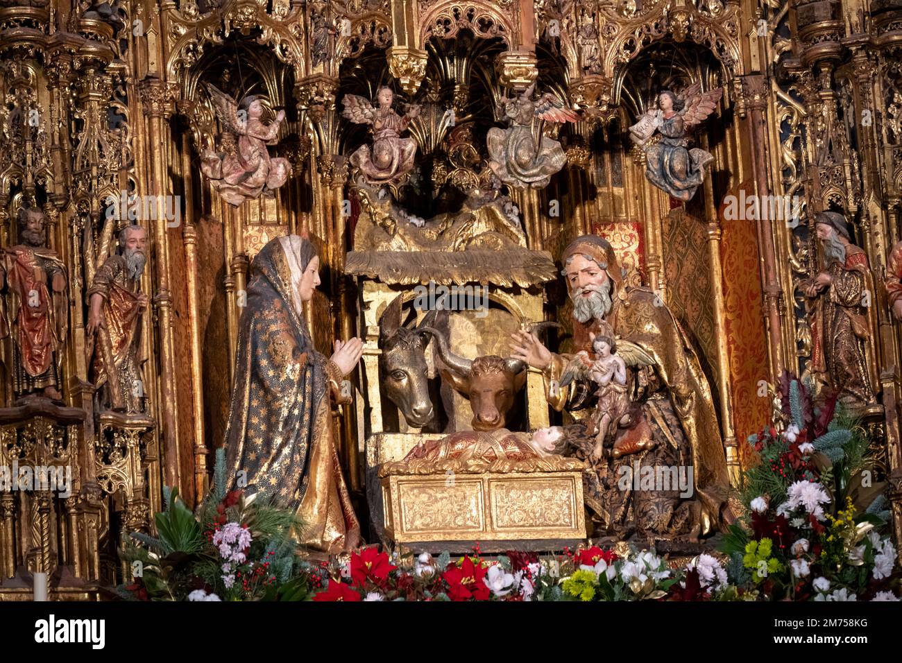 A close up detail of the main altar within the Cathedral of Seville Stock Photo