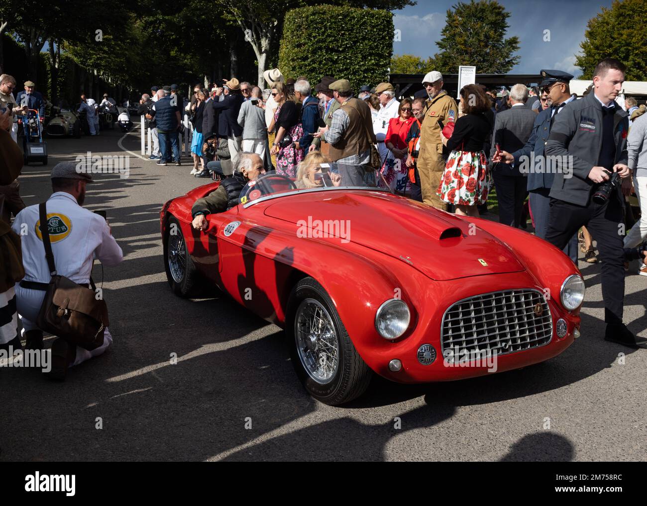 A Ferrari 166 MM Barchetta heads for the track at the 2022 Goodwood Revival Stock Photo
