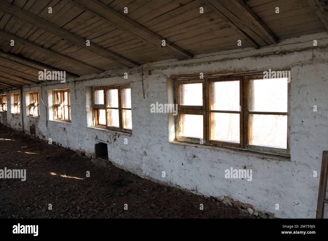 Abandoned farm. Indoors chicken farm. Stock Photo