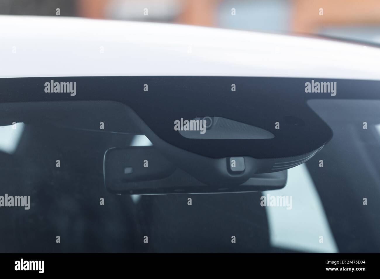 Windshield rain and light sensors of modern car. Car rain sensor Stock